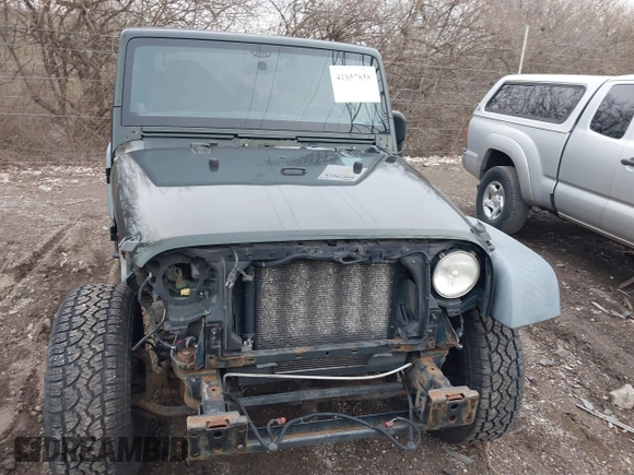 2011 Jeep Wrangler Sport with VIN 1J4AA2D18BL588273, listed as a IAAI auction lot 41857858 with 136,473 mi miles and . Bid and sale history available at carsss.com. Image 17.