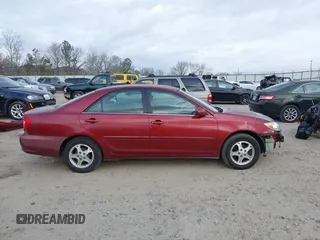 2002 Toyota Camry LE z VIN 4T1BE32K82U005531, wystawiony jako IAAI lot #41650283 z przebiegiem 328 259 mil mil oraz . Historia ofert i sprzedaży dostępna na DreamBid. Obrazek 14.