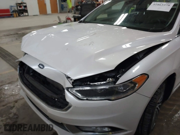 2018 Ford Fusion Titanium with VIN 3FA6P0RU1JR185937, listed as a IAAI auction lot 41863378 with 133,641 mi miles and . Bid and sale history available at DreamBid. Image 6.
