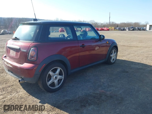 2009 MINI Cooper Hardtop with VIN WMWMF33509TU71339, listed as a IAAI auction lot 41777908 with 155,698 mi miles. Bid and sale history available at carsss.com. Image 4.
