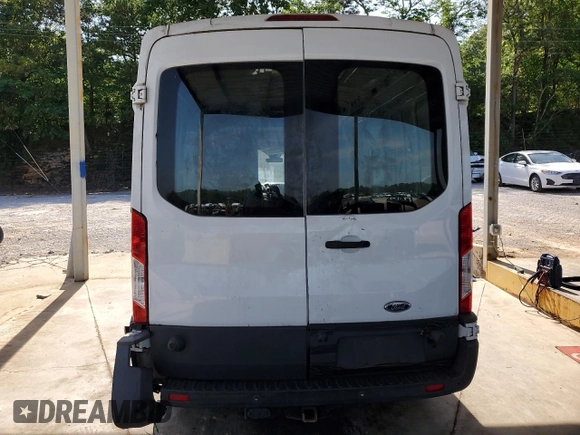 2015 Ford Transit Cargo with VIN 1FTNR2CG0FKA40351, listed as a Copart auction lot 57288885 with 348,368 mi miles and Clean title. Bid and sale history available at DreamBid. Image 6.