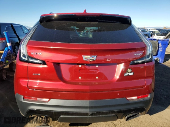 2022 Cadillac XT4 AWD Sport с VIN 1GYFZFR49NF130155, выставлен на аукционе Copart как лот 80286034 с пробегом 28 447 миль миль и Списание • Salvage title. История ставок и продаж доступна на DreamBid. Изображение 6.