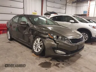 2013 Kia Optima EX with VIN 5XXGN4A72DG120129, listed as a IAAI auction lot 41858461 with 138,627 mi miles. Bid and sale history available at carsss.com. Image 1.