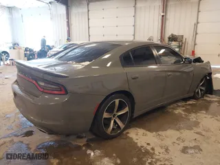 2017 Dodge Charger SE with VIN 2C3CDXBG0HH546619, listed as a IAAI auction lot 41617484 with 105,574 mi miles. Bid and sale history available at carsss.com. Image 4.