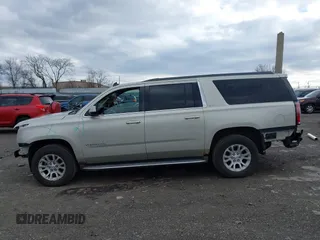 2015 GMC Yukon XL SLT with VIN 1GKS2HKC7FR100534, listed as a IAAI auction lot 41229658 with 207,947 mi miles. Bid and sale history available at carsss.com. Image 13.