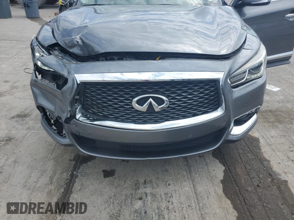 2019 Infiniti QX60 Pure with VIN 5N1DL0MN9KC566203, listed as a Copart auction lot 57137775 with 128,234 mi miles and Salvage title. Bid and sale history available at DreamBid. Image 11.