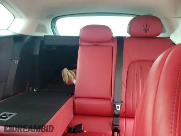2017 Maserati Levante S z VIN ZN661YUS3HX196812, wystawiony jako Copart lot #69257744 z przebiegiem Nie podano mil oraz Szkoda całkowita • Salvage title. Historia ofert i sprzedaży dostępna na DreamBid. Obrazek 10.