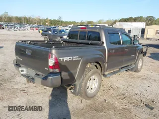 2014 Toyota Tacoma with VIN 3TMLU4EN3EM163162, listed as a IAAI auction lot 41930392 with 167,368 mi miles and . Bid and sale history available at DreamBid. Image 4.
