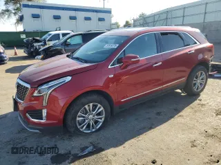 2023 Cadillac XT5 AWD Premium Luxury z VIN 1GYKNDRS1PZ142878, wystawiony jako Copart lot #57619275 z przebiegiem 49 739 mil mil oraz Szkoda całkowita • Salvage title. Historia ofert i sprzedaży dostępna na DreamBid. Obrazek 1.