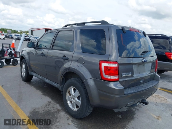 2012 Ford Escape XLS with VIN 1FMCU0C75CKA40329, listed as a IAAI auction lot 42494805 with 223,218 mi miles and . Bid and sale history available at DreamBid. Image 3.