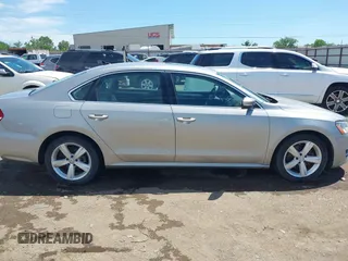 2013 Volkswagen Passat SE with VIN 1VWBP7A37DC140683, listed as a IAAI auction lot 42245864 with 125,898 mi miles and . Bid and sale history available at DreamBid. Image 13.