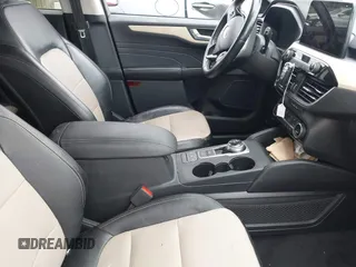 2021 Ford Escape Titanium Hybrid with VIN 1FMCU9DZ5MUA18079, listed as a IAAI auction lot 42340093 with 71,630 mi miles and . Bid and sale history available at DreamBid. Image 5.