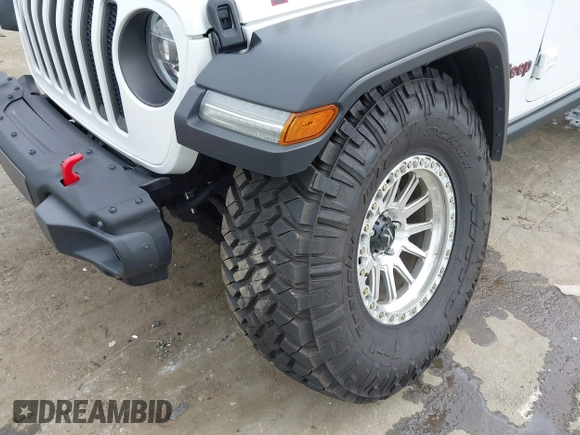 2021 Jeep Wrangler Unlimited Rubicon with VIN 1C4HJXFG7MW527498, listed as a IAAI auction lot 42393520 with 18,085 mi miles and . Bid and sale history available at DreamBid. Image 6.
