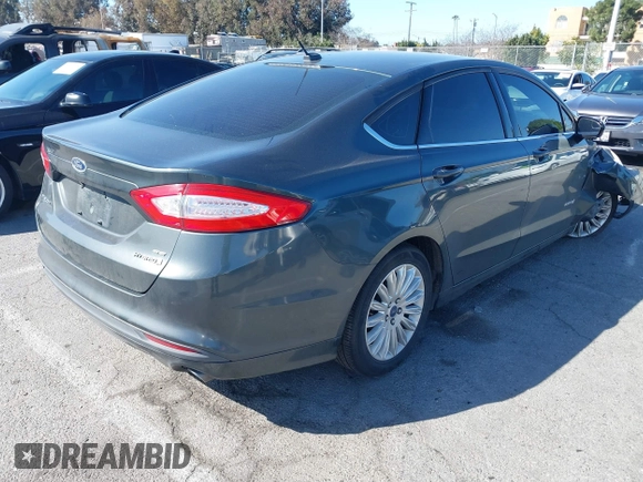 2015 Ford Fusion SE Hybrid with VIN 3FA6P0LU4FR306928, listed as a IAAI auction lot 41826720 with 83,983 mi miles. Bid and sale history available at carsss.com. Image 4.