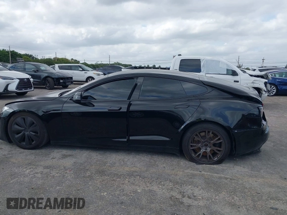 2023 Tesla Model S with VIN 5YJSA1E53PF510757, listed as a IAAI auction lot 42075624 with Not provided miles and . Bid and sale history available at DreamBid. Image 15.