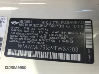 2009 MINI Hardtop S with VIN WMWMF73559TW83208, listed as a Copart auction lot 57347015 with 76,898 mi miles and Salvage title. Bid and sale history available at DreamBid. Image 13.