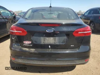 2017 Ford Focus SE z VIN 1FADP3F24HL316007, wystawiony jako Copart lot #56416645 z przebiegiem 79 085 mil mil oraz Szkoda całkowita • Salvage title. Historia ofert i sprzedaży dostępna na DreamBid. Obrazek 6.