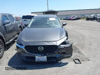 2021 Mazda CX-30 Select z VIN 3MVDMABL3MM233701, wystawiony jako IAAI lot #42086778 z przebiegiem Nie podano mil oraz . Historia ofert i sprzedaży dostępna na DreamBid. Obrazek 13.