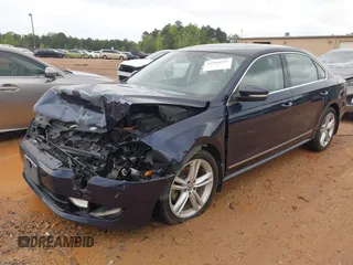 2014 Volkswagen Passat TDI SEL Premium with VIN 1VWCN7A36EC054891, listed as a IAAI auction lot 41964556 with 120,658 mi miles. Bid and sale history available at carsss.com. Image 2.