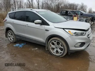 2017 Ford Escape Titanium with VIN 1FMCU9J9XHUD18954, listed as a Copart auction lot 46787245 with 222,986 mi miles and Clean Title. Bid and sale history available at carsss.com. Image 4.