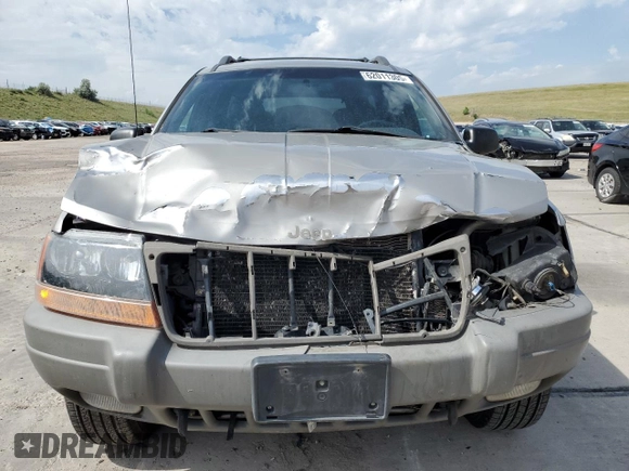 2000 Jeep Grand Cherokee Laredo with VIN 1J4GW48N1YC324356, listed as a Copart auction lot 62011305 with 242,322 mi miles and Salvage title. Bid and sale history available at DreamBid. Image 5.