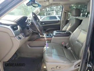 2015 Chevrolet Tahoe LTZ with VIN 1GNSCCKC2FR693500, listed as a Copart auction lot 60225195 with 206,210 mi miles and Salvage title. Bid and sale history available at DreamBid. Image 7.