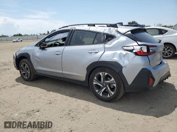 2024 Subaru Crosstrek Premium с VIN JF2GUADC5R8393104, выставлен на аукционе Copart как лот 55308255 с пробегом 4 077 миль миль и Списание • Salvage title. История ставок и продаж доступна на DreamBid. Изображение 2.