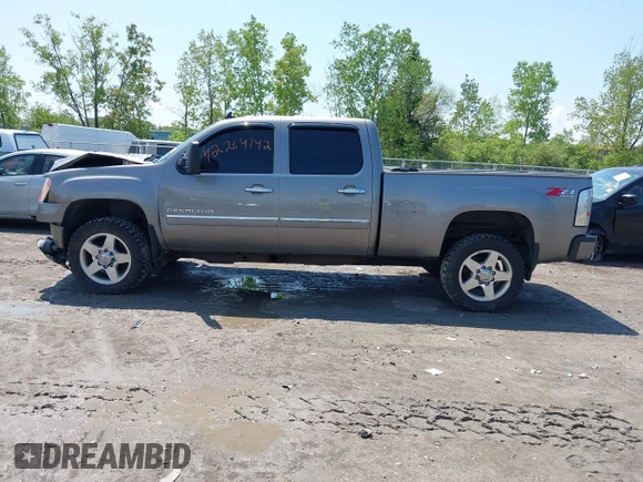 2013 GMC Sierra 2500HD Denali with VIN 1GT125E80DF154320, listed as a IAAI auction lot 42264742 with 171,013 mi miles and . Bid and sale history available at DreamBid. Image 14.