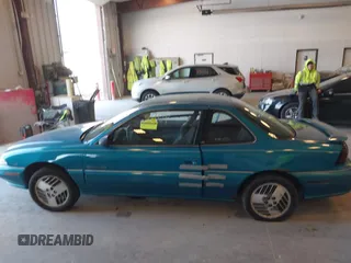 1994 Pontiac Grand Am z VIN 1G2NE15M5RM500643, wystawiony jako IAAI lot #42069901 z przebiegiem 77 129 mil mil oraz . Historia ofert i sprzedaży dostępna na DreamBid. Obrazek 14.