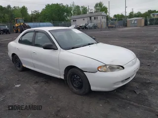 1998 Hyundai Elantra with VIN KMHJF24M5WU664139, listed as a IAAI auction lot 42253898 with 143,360 mi miles and . Bid and sale history available at DreamBid. Image 1.