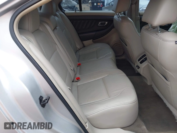 2012 Ford Taurus SEL z VIN 1FAHP2EW1CG132855, wystawiony jako IAAI lot #42256022 z przebiegiem 177 749 mil mil oraz . Historia ofert i sprzedaży dostępna na DreamBid. Obrazek 8.