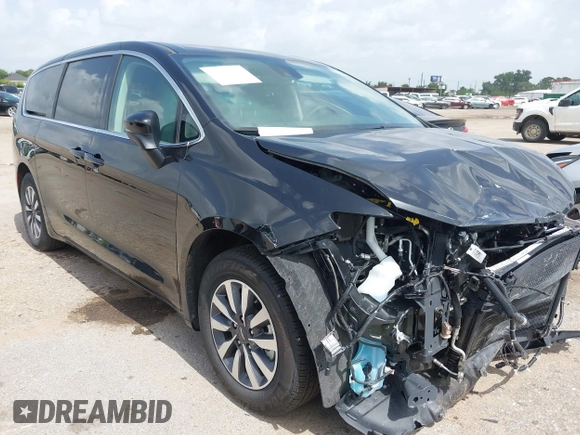 2023 Chrysler Pacifica Hybrid Touring L with VIN 2C4RC1L75PR611901, listed as a IAAI auction lot 42626500 with 44,156 mi miles and . Bid and sale history available at DreamBid. Image 1.