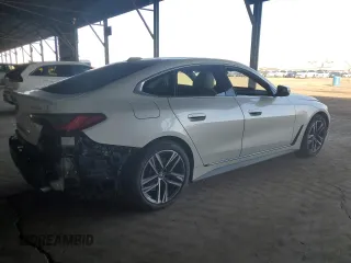 2023 BMW 4 Series 430i xDrive with VIN WBA73AV06PFN88754, listed as a Copart auction lot 80533254 with 28,502 mi miles and Salvage title. Bid and sale history available at DreamBid. Image 3.