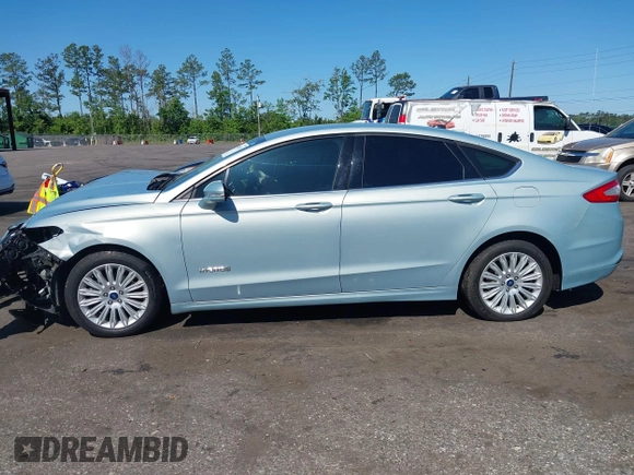 2014 Ford Fusion SE Hybrid with VIN 3FA6P0LU3ER373311, listed as a IAAI auction lot 42048513 with 155,935 mi miles. Bid and sale history available at carsss.com. Image 14.