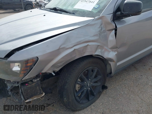 2019 Dodge Journey SE z VIN 3C4PDCBB5KT861358, wystawiony jako IAAI lot #41947841 z przebiegiem 82 099 mil mil oraz . Historia ofert i sprzedaży dostępna na DreamBid. Obrazek 17.