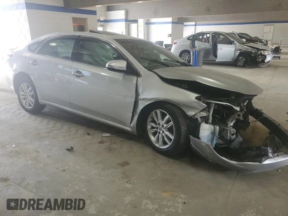 2013 Toyota Avalon XLE with VIN 4T1BK1EB0DU001291, listed as a Copart auction lot 54129175 with 107,242 mi miles and Salvage Title. Bid and sale history available at DreamBid. Image 4.