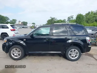 2009 Mercury Mariner Premier with VIN 4M2CU87GX9KJ20368, listed as a IAAI auction lot 42547760 with 155,665 mi miles and . Bid and sale history available at DreamBid. Image 14.