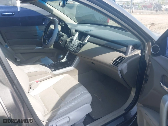 2008 Acura RDX with VIN 5J8TB18208A010067, listed as a IAAI auction lot 42094217 with 166,097 mi miles. Bid and sale history available at carsss.com. Image 5.