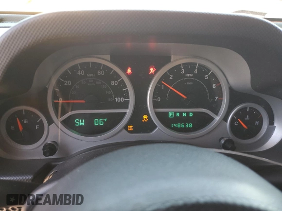 2010 Jeep Wrangler Rubicon with VIN 1J4BA6D14AL167077, listed as a Copart auction lot 54233795 with 148,638 mi miles and Salvage title. Bid and sale history available at DreamBid. Image 9.