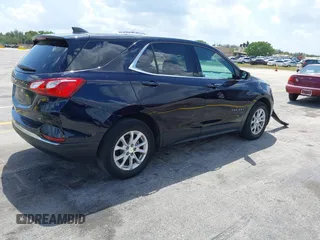 2020 Chevrolet Equinox LT with VIN 3GNAXJEV5LS592266, listed as a IAAI auction lot 41924328 with 61,574 mi miles and . Bid and sale history available at DreamBid. Image 4.