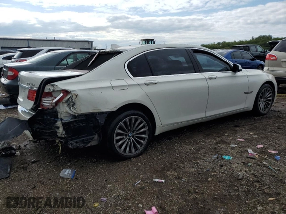 2012 BMW 7 Series 750Li с VIN WBAKB8C55CC962772, выставлен на аукционе Copart как лот 57621525 с пробегом 127 259 миль миль и Списание • Salvage title. История ставок и продаж доступна на DreamBid. Изображение 3.