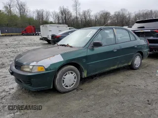 1998 Mitsubishi Mirage DE z VIN JA3AY26A2WU042095, wystawiony jako Copart lot #84700394 z przebiegiem 124 362 mil mil oraz Czysty tytuł • Clean title. Historia ofert i sprzedaży dostępna na DreamBid. Obrazek 1.