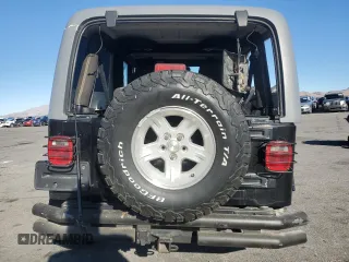 2005 Jeep Wrangler Unlimited with VIN 1J4FA44S75P305935, listed as a Copart auction lot 45993995 with 116,569 mi miles and Salvage Title. Bid and sale history available at carsss.com. Image 6.