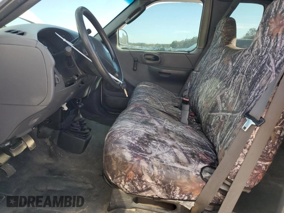 2003 Ford F-150 XL with VIN 1FTRX18L13NB64579, listed as a Copart auction lot 49496705 with 258,499 mi miles and Salvage Title. Bid and sale history available at carsss.com. Image 7.