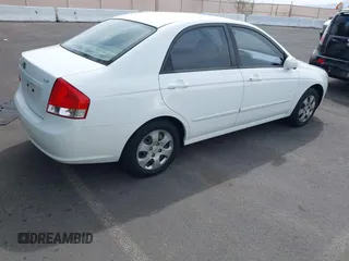 2009 Kia Spectra EX with VIN KNAFE221795630995, listed as a IAAI auction lot 41928252 with 126,694 mi miles. Bid and sale history available at carsss.com. Image 4.