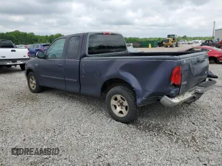 1999 Ford F-150 with VIN 2FTZX1729XCA64069, listed as a Copart auction lot 56246845 with Not provided miles and Salvage title. Bid and sale history available at DreamBid. Image 2.