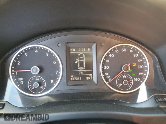 2013 Volkswagen Tiguan S with VIN WVGAV7AX8DW501081, listed as a Copart auction lot 88065365 with 157,312 mi miles and Salvage title. Bid and sale history available at DreamBid. Image 9.