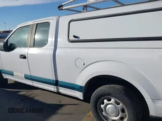 2016 Ford F-150 XL with VIN 1FTEX1C85GKF35266, listed as a IAAI auction lot 41491645 with 158,966 mi miles and . Bid and sale history available at carsss.com. Image 14.