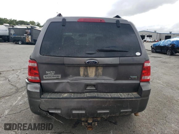 2012 Ford Escape XLT с VIN 1FMCU9DGXCKB34077, выставлен на аукционе Copart как лот 71502944 с пробегом 297 902 миль миль и Списание • Salvage title. История ставок и продаж доступна на DreamBid. Изображение 6.