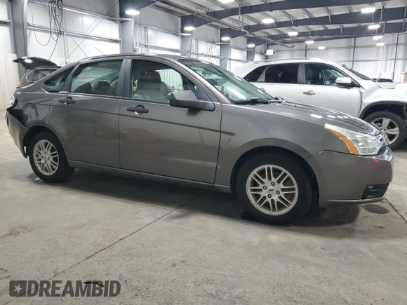 2009 Ford Focus SE with VIN 1FAHP35N09W246843, listed as a Copart auction lot 53151545 with 188,432 mi miles and Salvage Title. Bid and sale history available at carsss.com. Image 4.